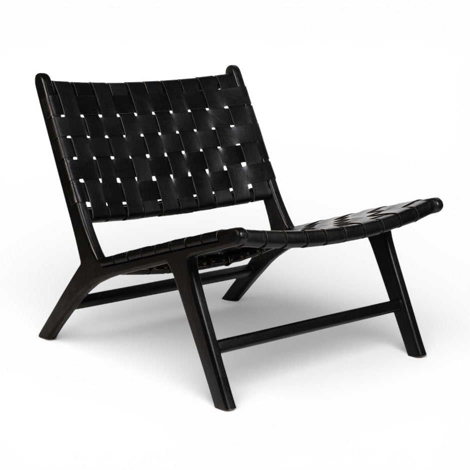 Black woven chair on a white background