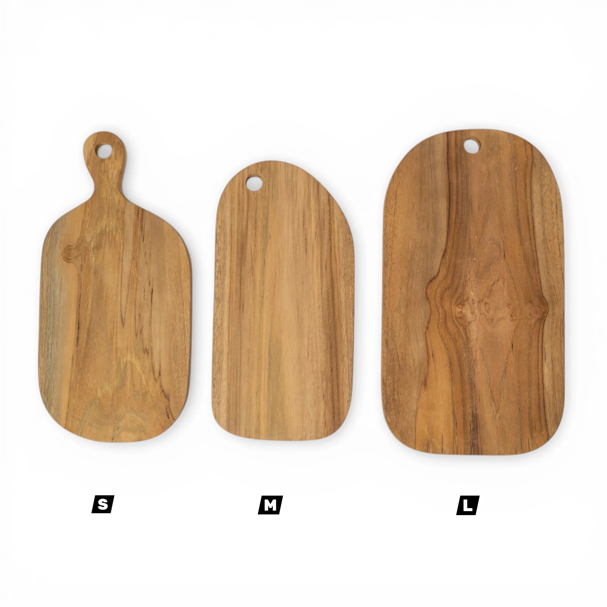 Teak cutting board by Kayu Living showing a smooth, rectangular wooden surface suitable for food preparation.