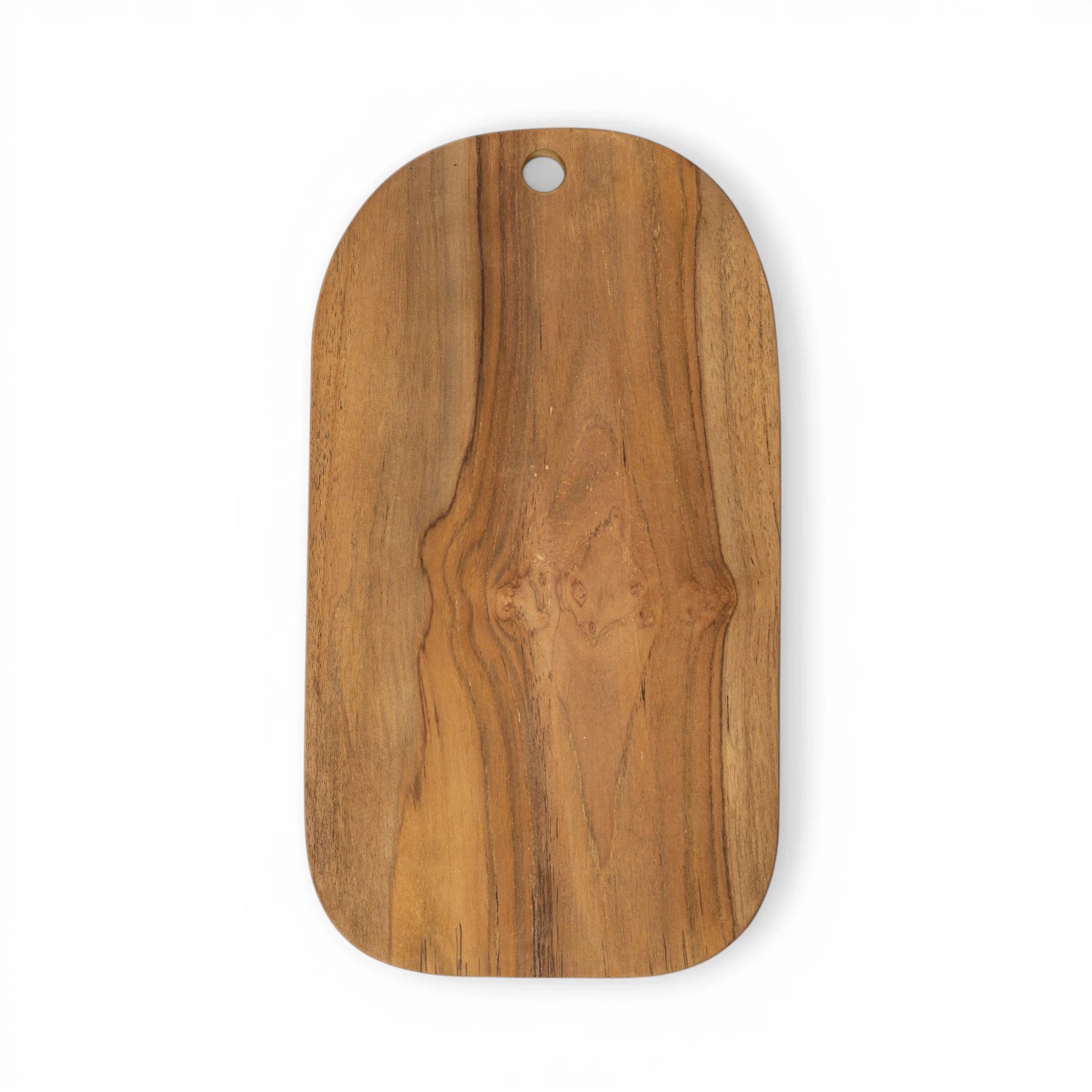 Teak cutting board by Kayu Living, showing a smooth rectangular wooden surface ideal for food prep.