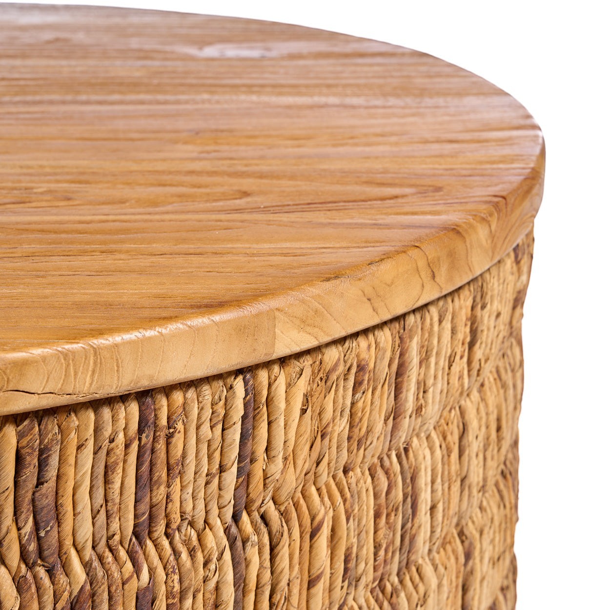 Kayu Living Abaca Round Natural Magani coffee table with a smooth teak wood top and handwoven abaca fiber base.