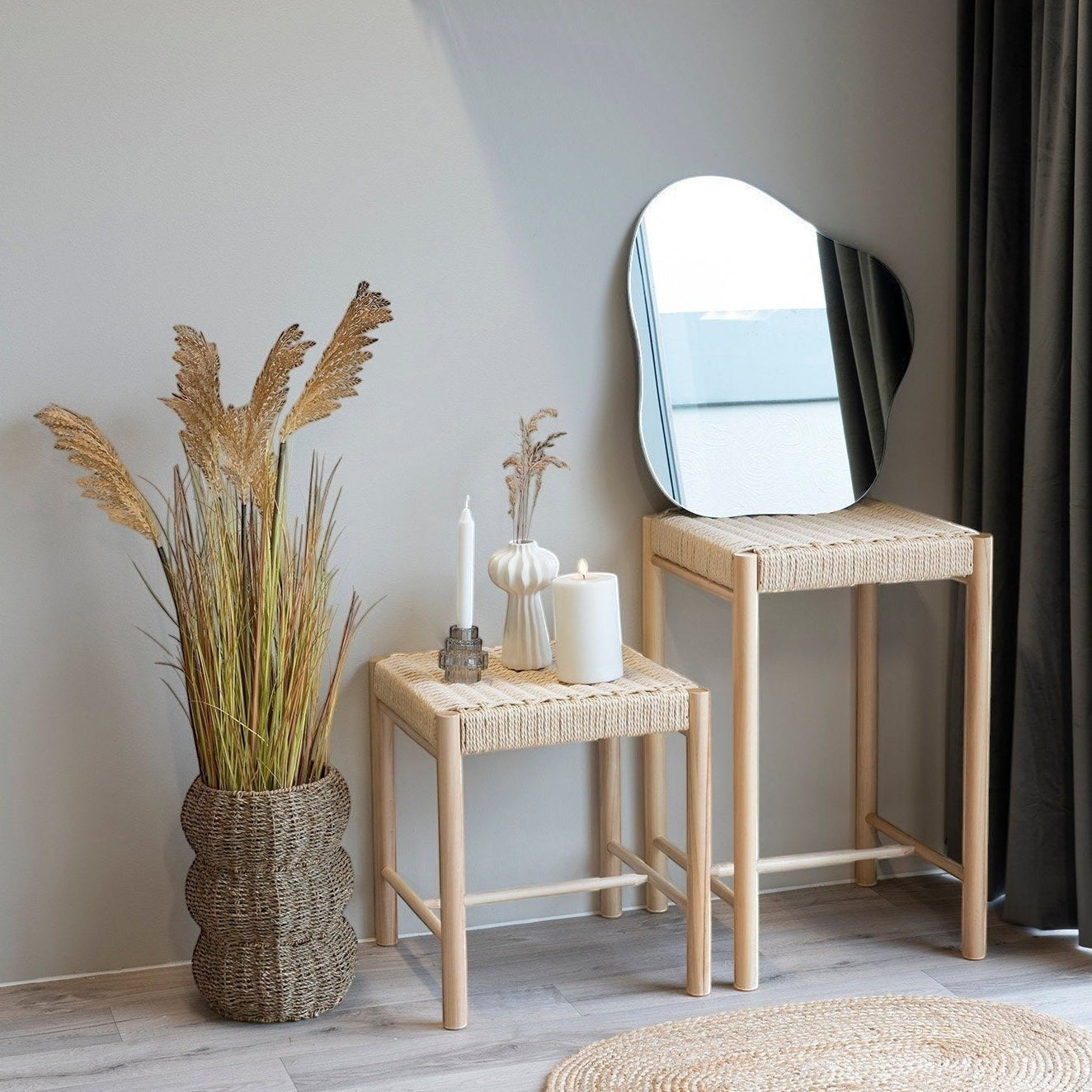 Kayu Living Abano stool, handcrafted poplar wood with natural woven paper-cord seat. Neutral finish.