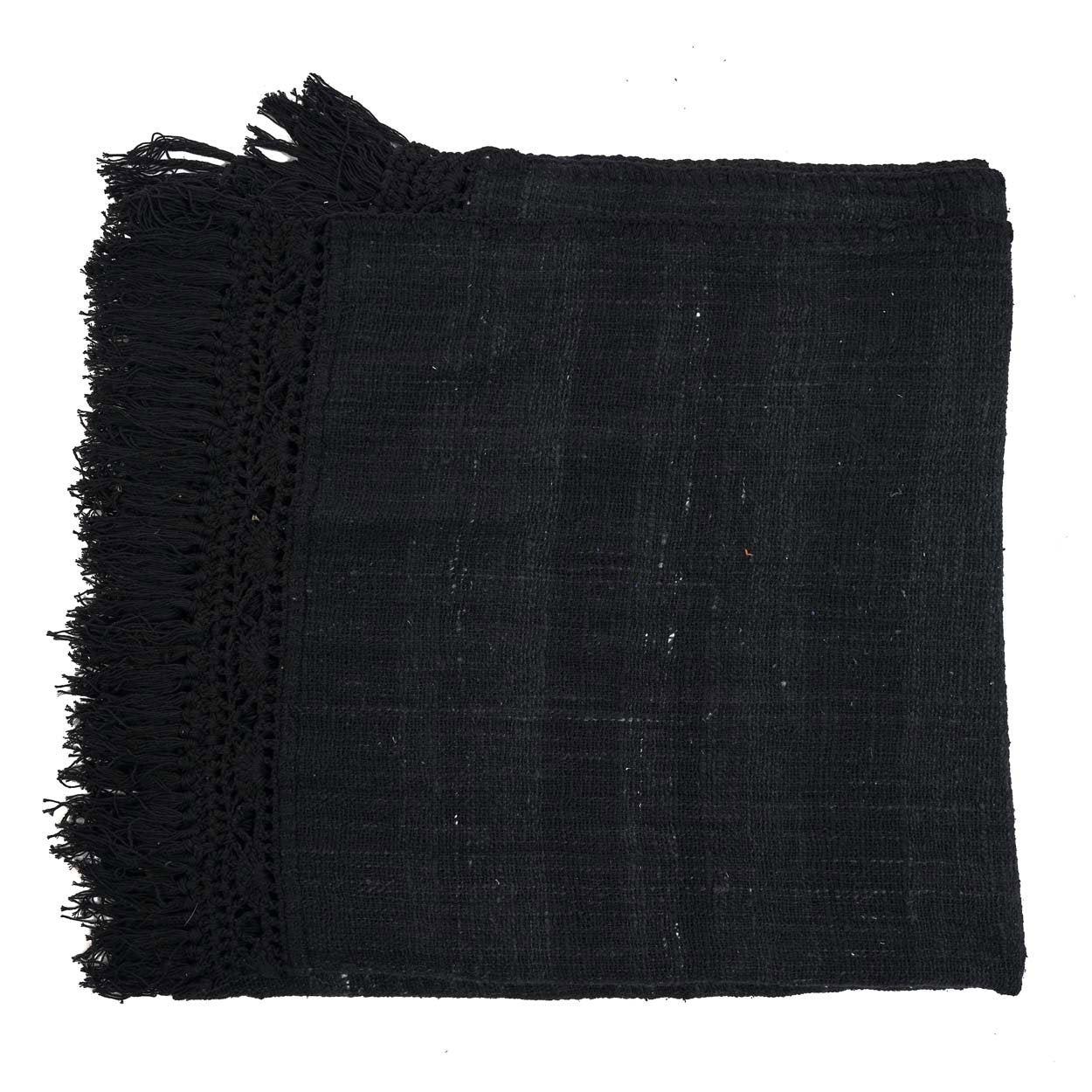Kayu Living black cotton Gypsy bed throw featuring a textured weave and decorative fringe edges.