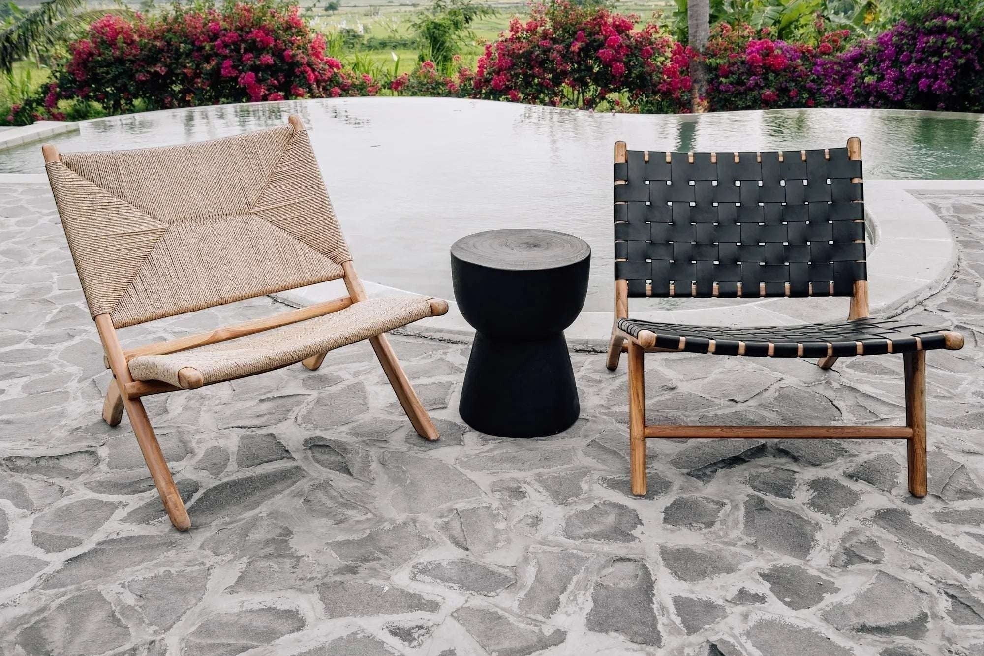 Kayu Living Umalas black handwoven leather lounge chair with teak frame, modern design.
