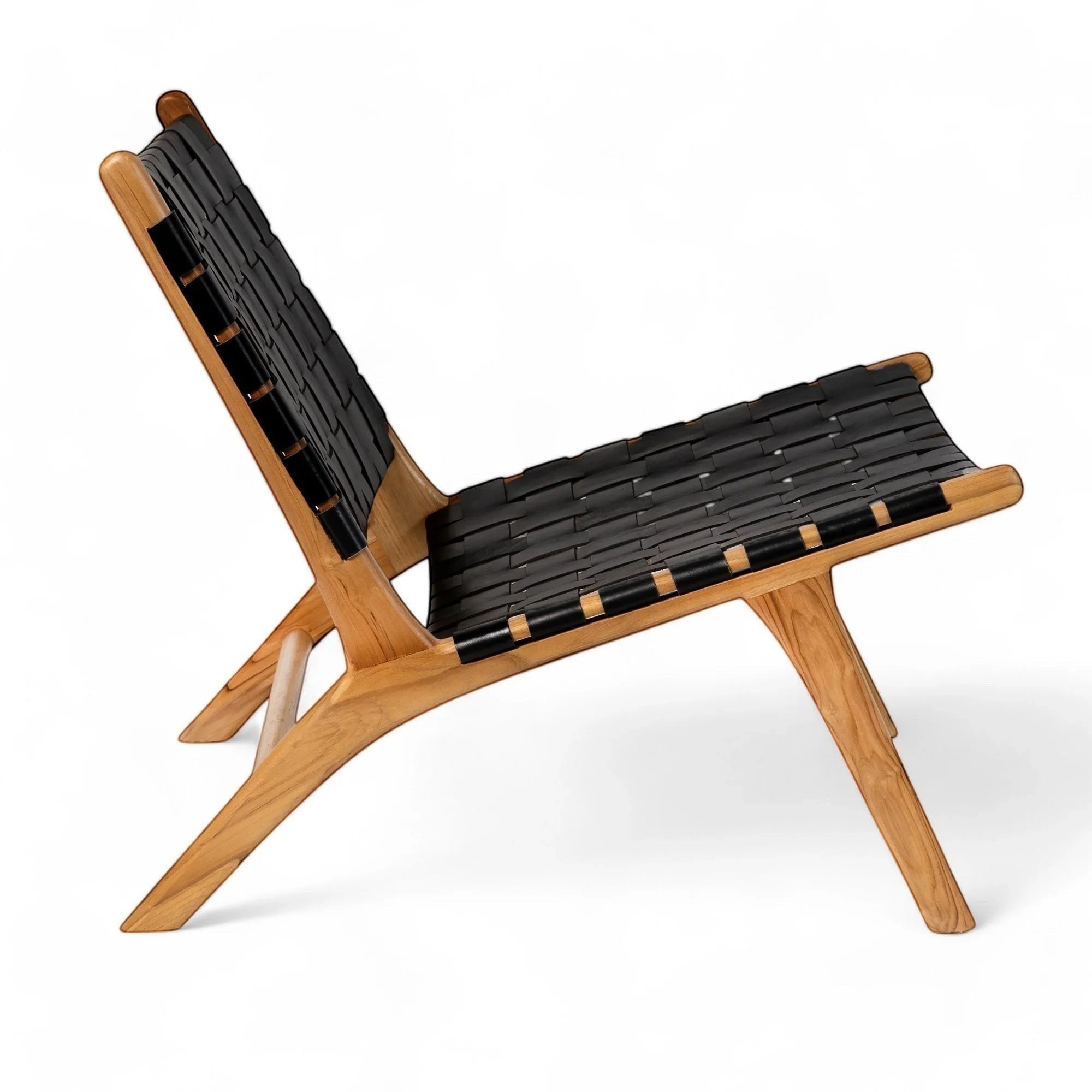 Kayu Living Umalas black handwoven leather lounge chair with teak frame.