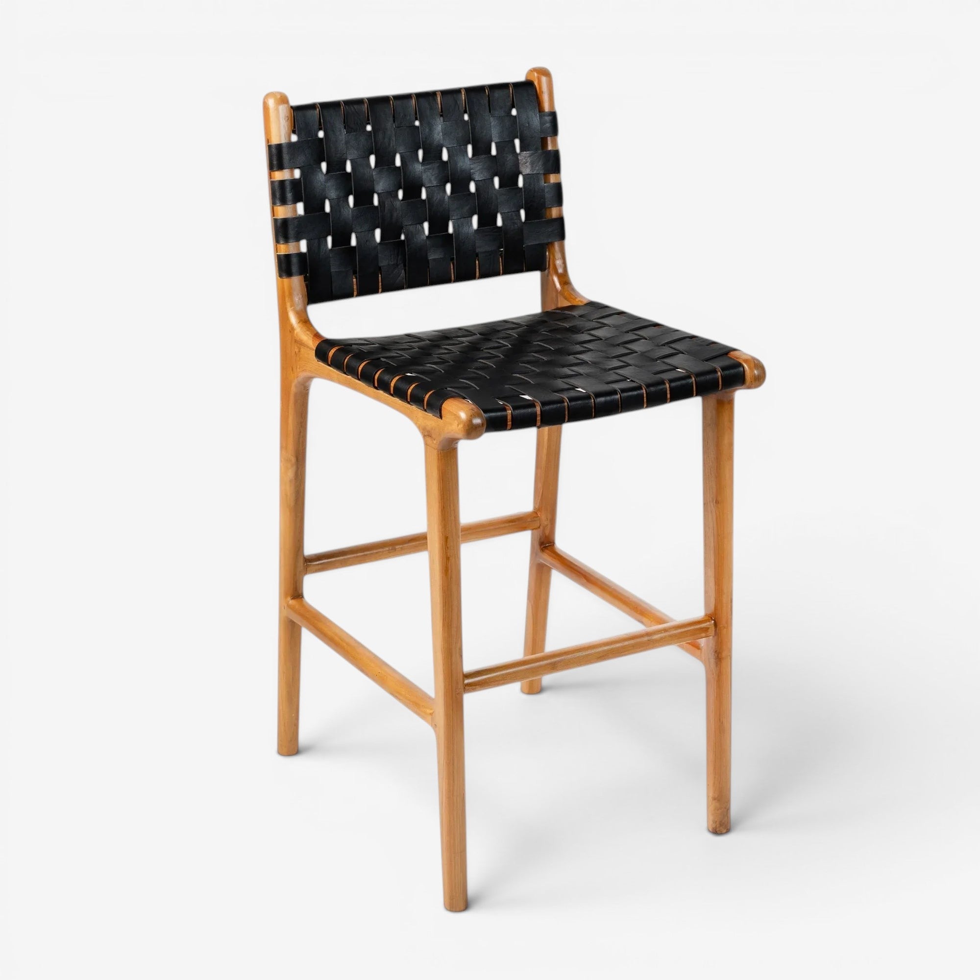 Kayu Living Umalas counter stool with woven black leather seat and natural teak wood frame.