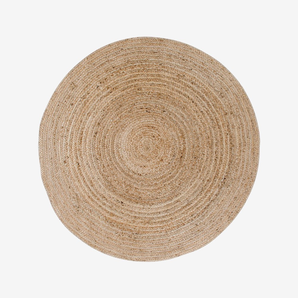 Kayu Living Bombay braided jute rug, natural, 120 cm diameter, with a textured, organic weave.