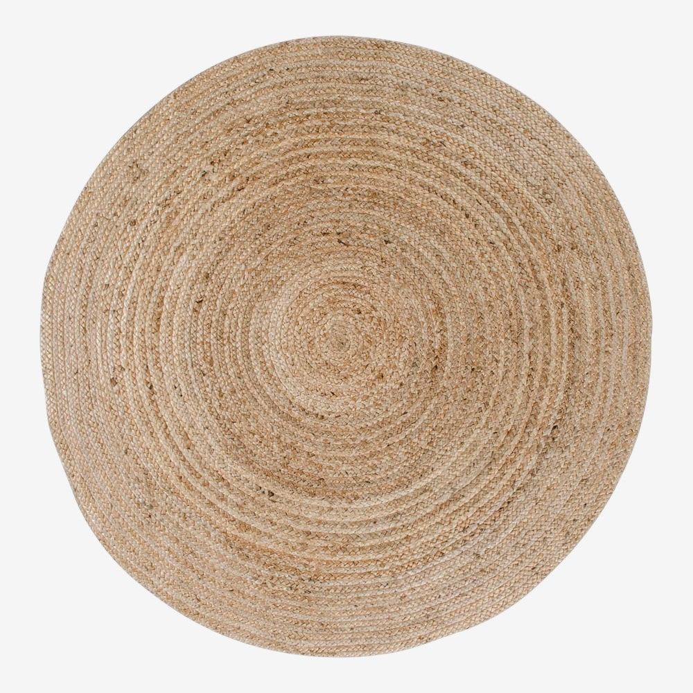 Kayu Living Bombay braided jute rug, natural, 180 cm diameter, with a textured, rustic design.