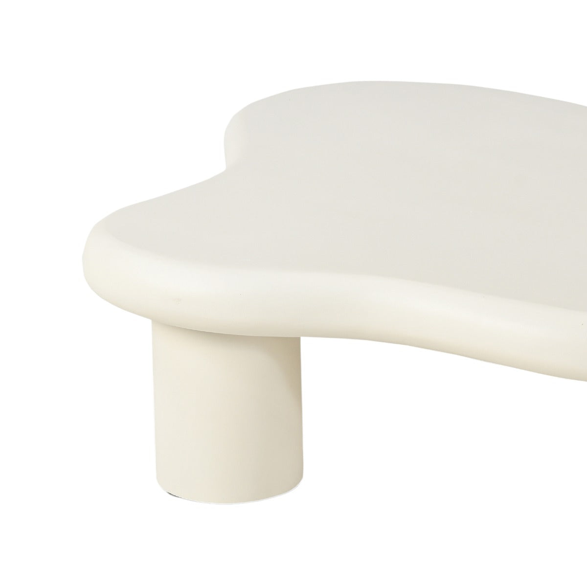 Kayu Living Brix Feline Sandy coffee table with an organic, beige concrete-ciré top and cylindrical legs.