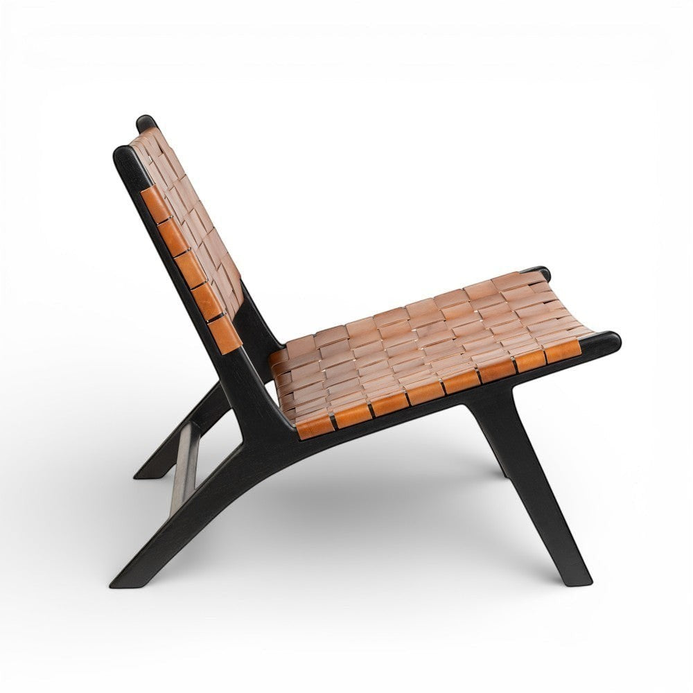Kayu Living Philippa lounge chair with handwoven brown leather seat and black teak frame.