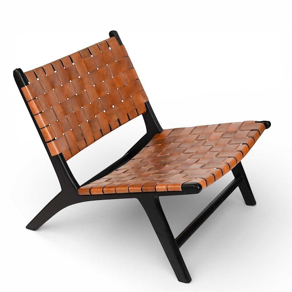 Kayu Living Philippa lounge chair with handwoven brown leather seat and black teak frame.