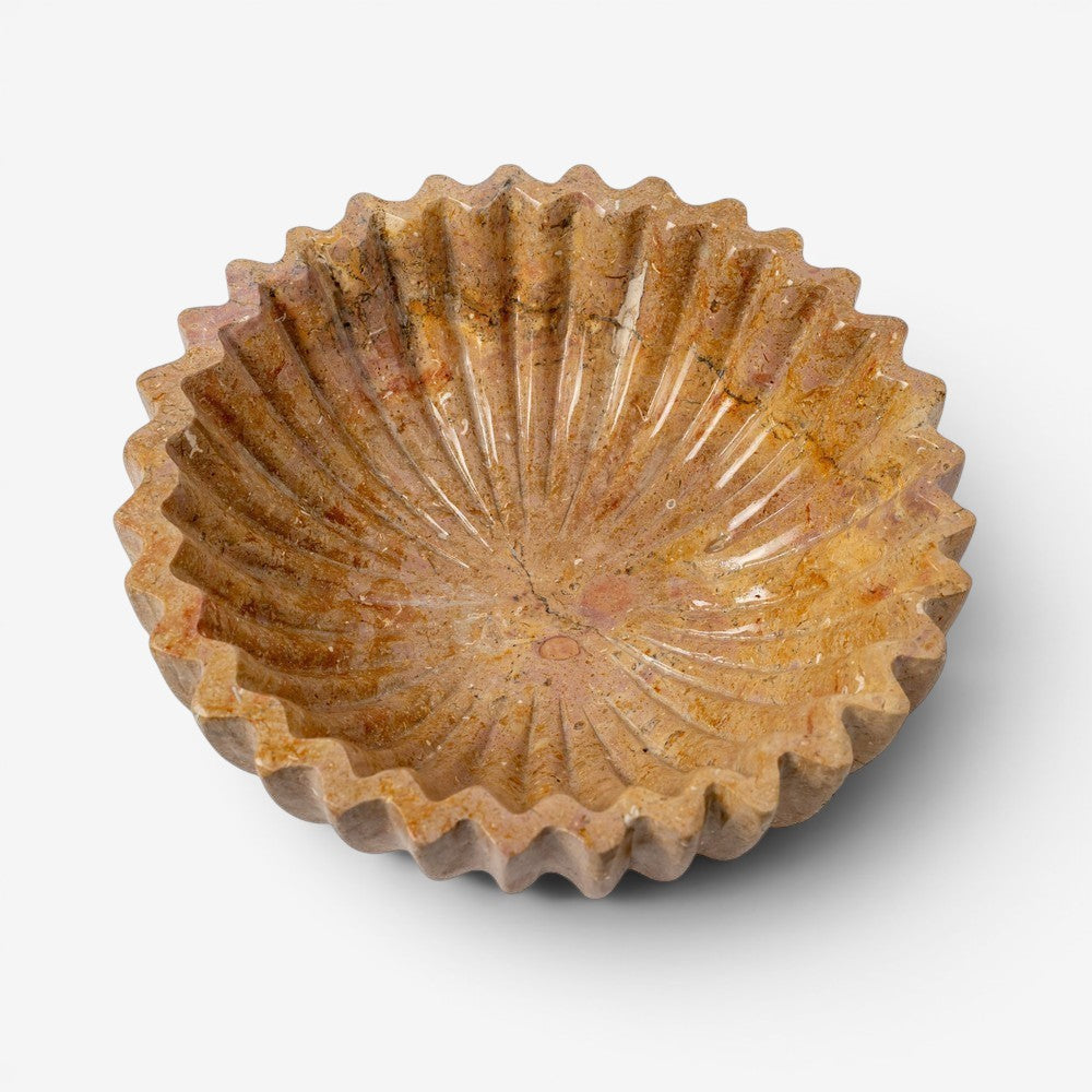 Kayu Living caramel wavy edge onyx stone bowl with fluted interior and natural veining. Ideal for serving or decor.
