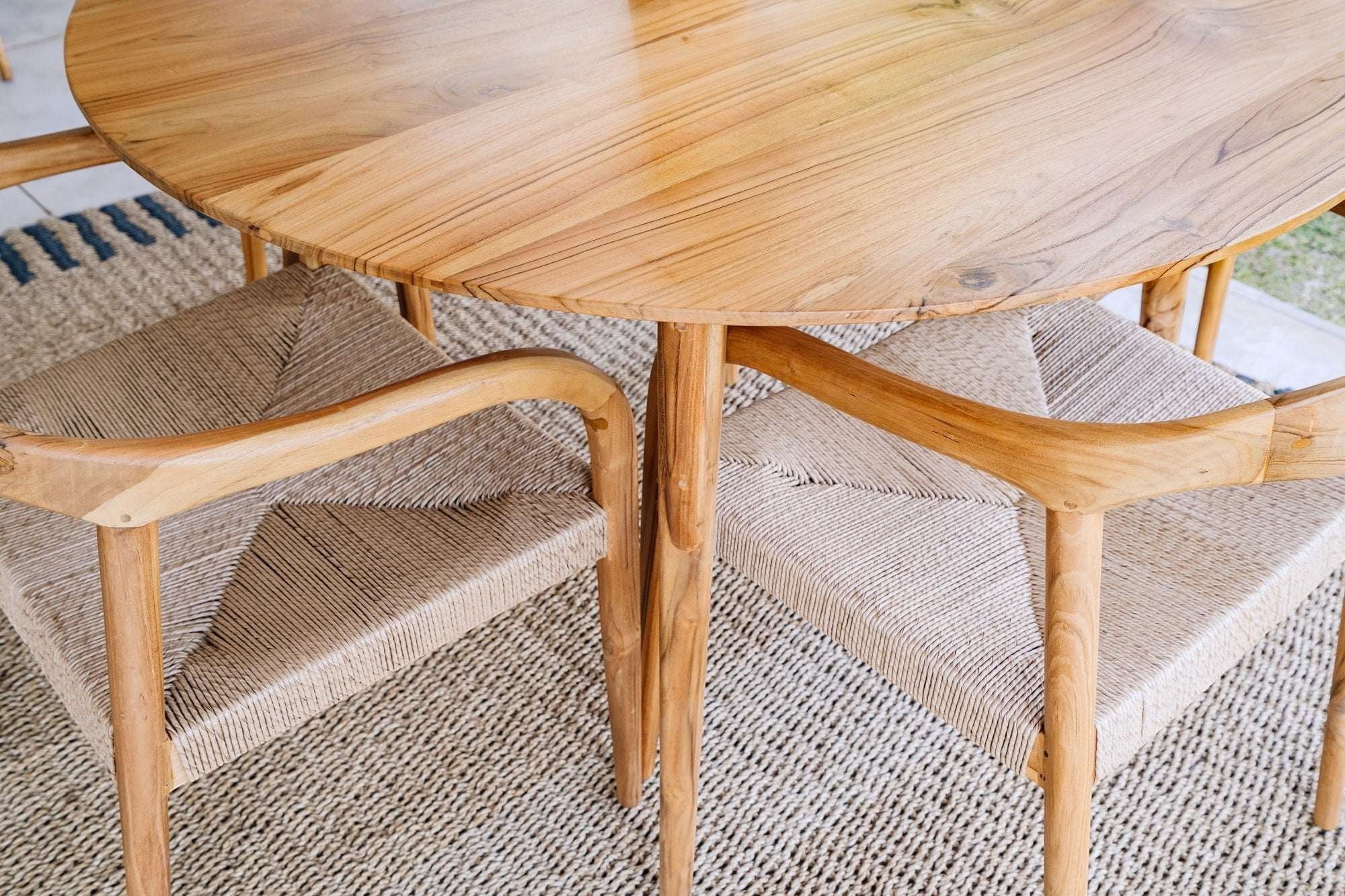 Kayu Living Cemagi chair with natural teak frame and handwoven rope seat and back. Indoor/outdoor dining chair.