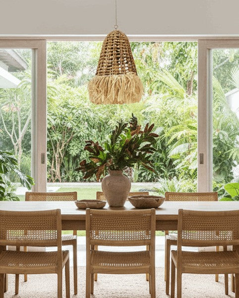 Kayu Living Enceng pendant lamp, handcrafted from natural water hyacinth with a fringed bottom, perfect for dining rooms.