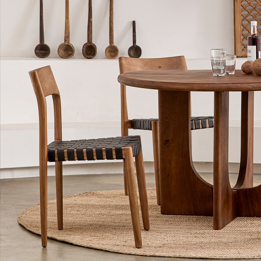 Kayu Living Freya dining chair with black woven leather seat and natural wood frame. Set of 2.