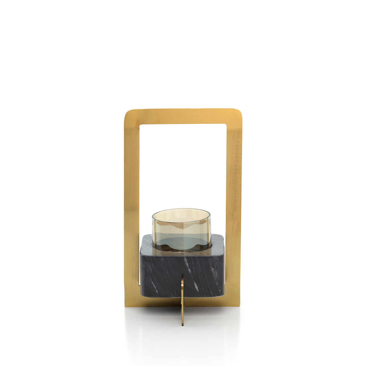 Kayu Living sculptural candle holder featuring black marble, a brass-gold frame, and a clear glass votive insert.