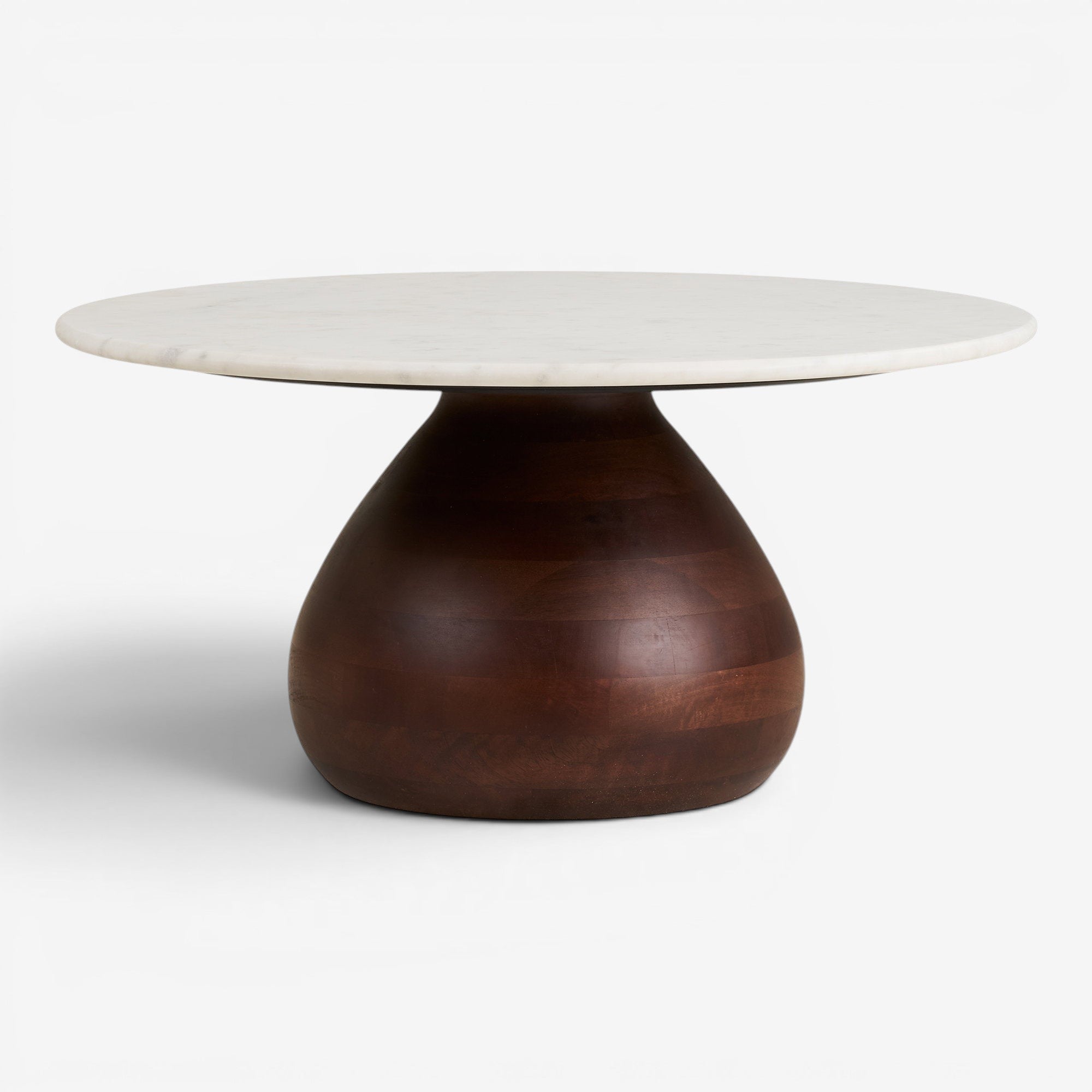 Kayu Living Heide round coffee table with a white marble top and sculptural dark brown mango wood base