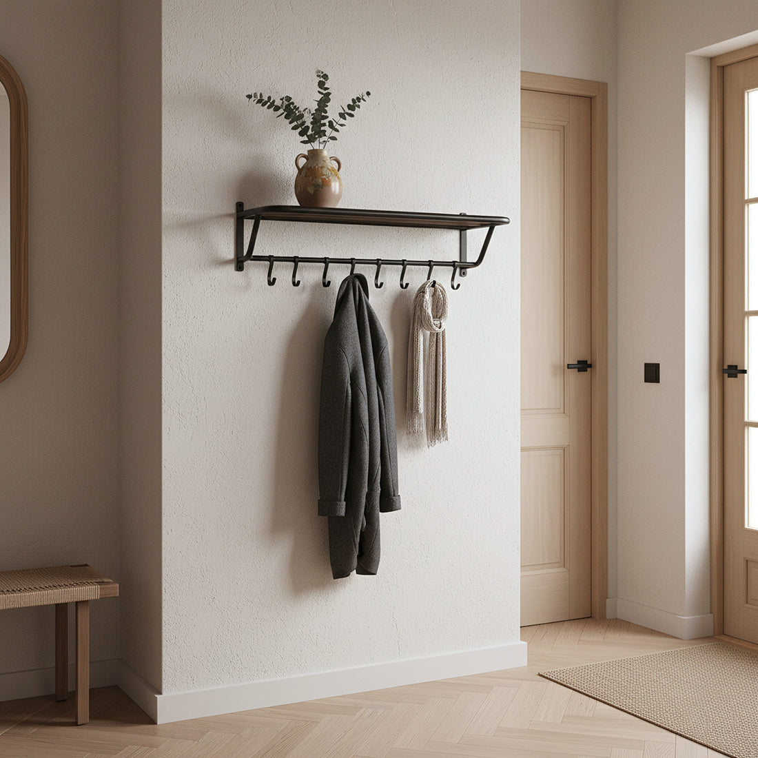 Kayu Living industrial wall-mounted coat rack with recycled wood shelf and eight black metal hooks in a hallway.