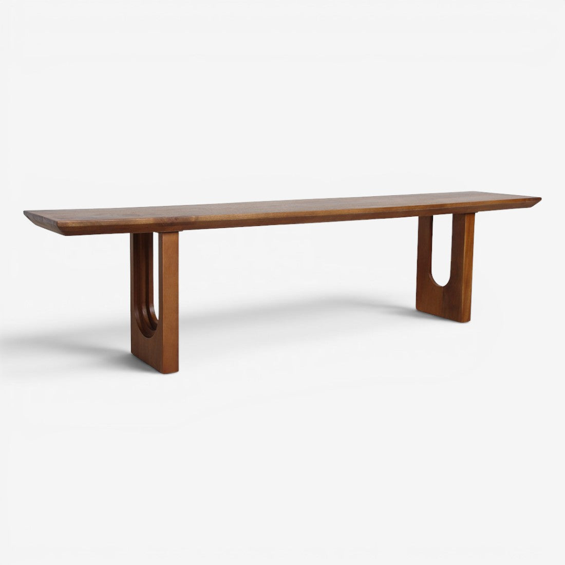 Kayu Living 180cm dining bench made of sustainably sourced mango wood with a chamfered edge and unique U-shaped legs.