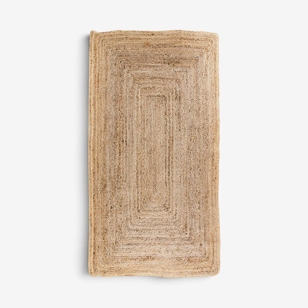 Kayu Living rectangular handwoven natural jute rug with a textured braided design for hallways and kitchens.