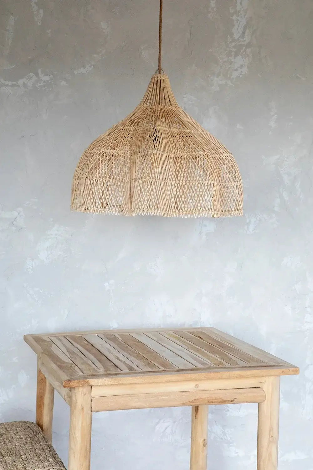 Kayu Living natural rattan pendant lamp with a unique woven shape, boho style.