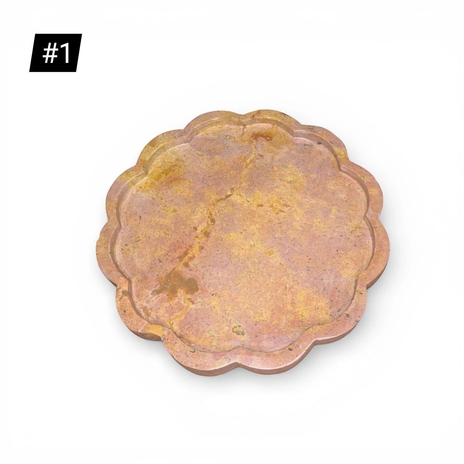 Kayu Living Petal Tray in caramel veined onyx stone with pink, ochre, and terracotta hues. Features a wavy, petal-shaped edge.