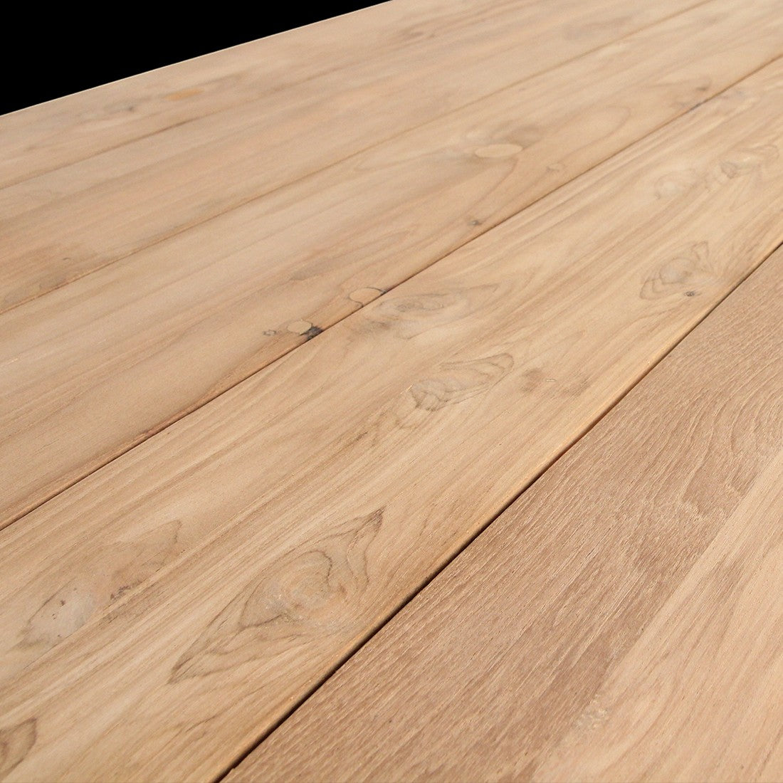 Close-up of the natural wood grain texture on a Kayu Living Primavera recycled teak garden table surface.