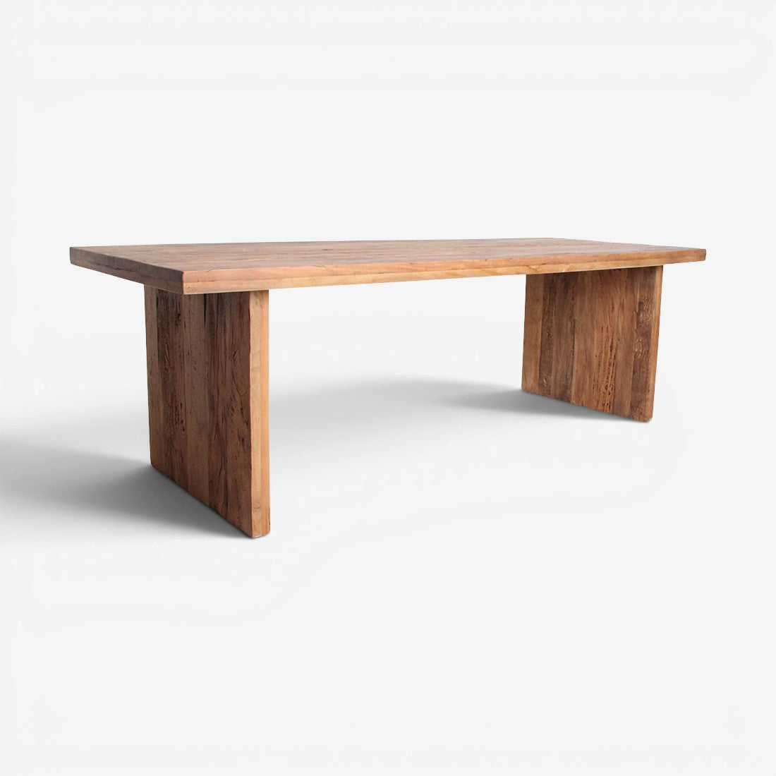 Kayu Living Farmwood waterfall dining table made from reclaimed timber with natural grain and weathered wood texture.