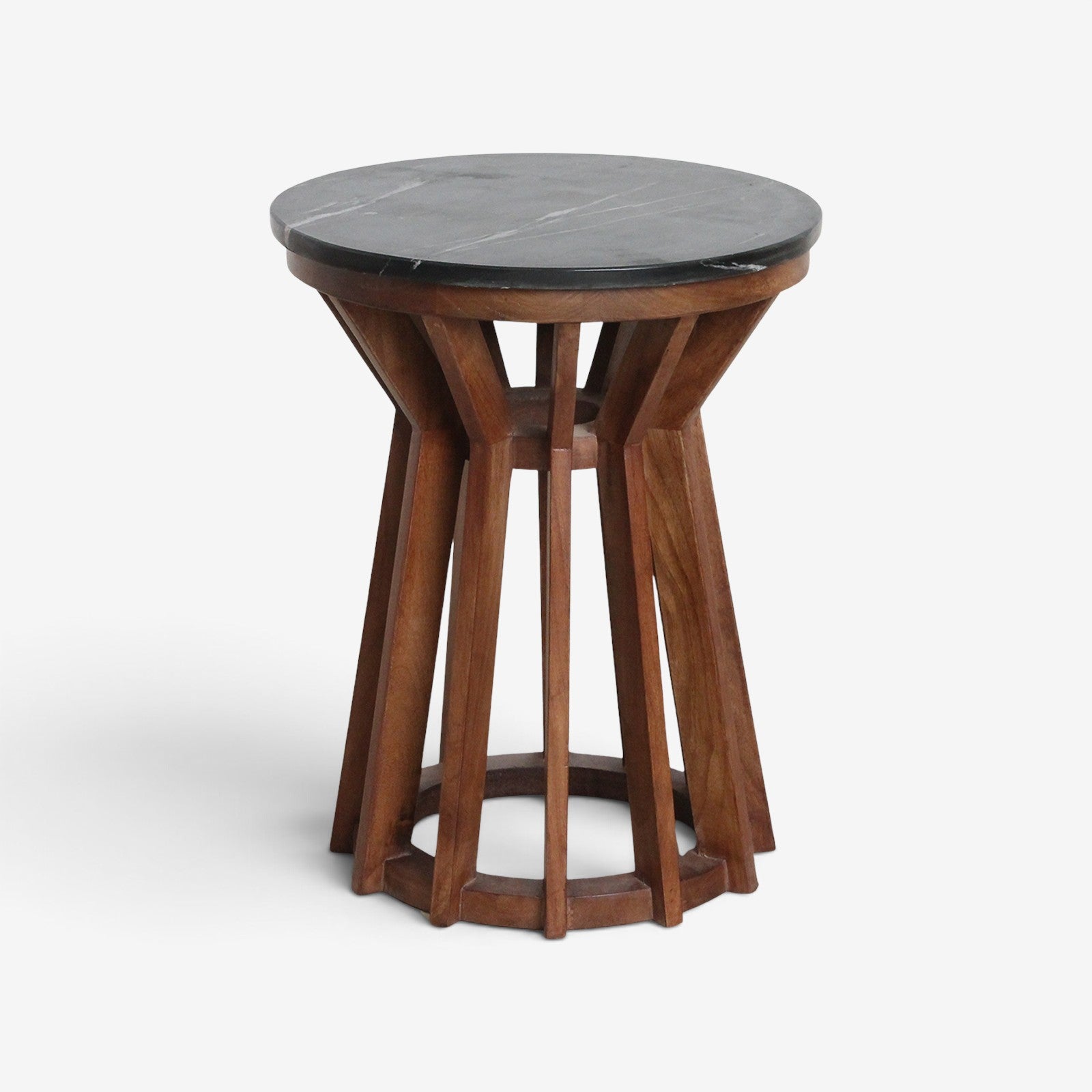 Kayu Living Sabah side table with a round black marble top and a dark mango wood spoked base.