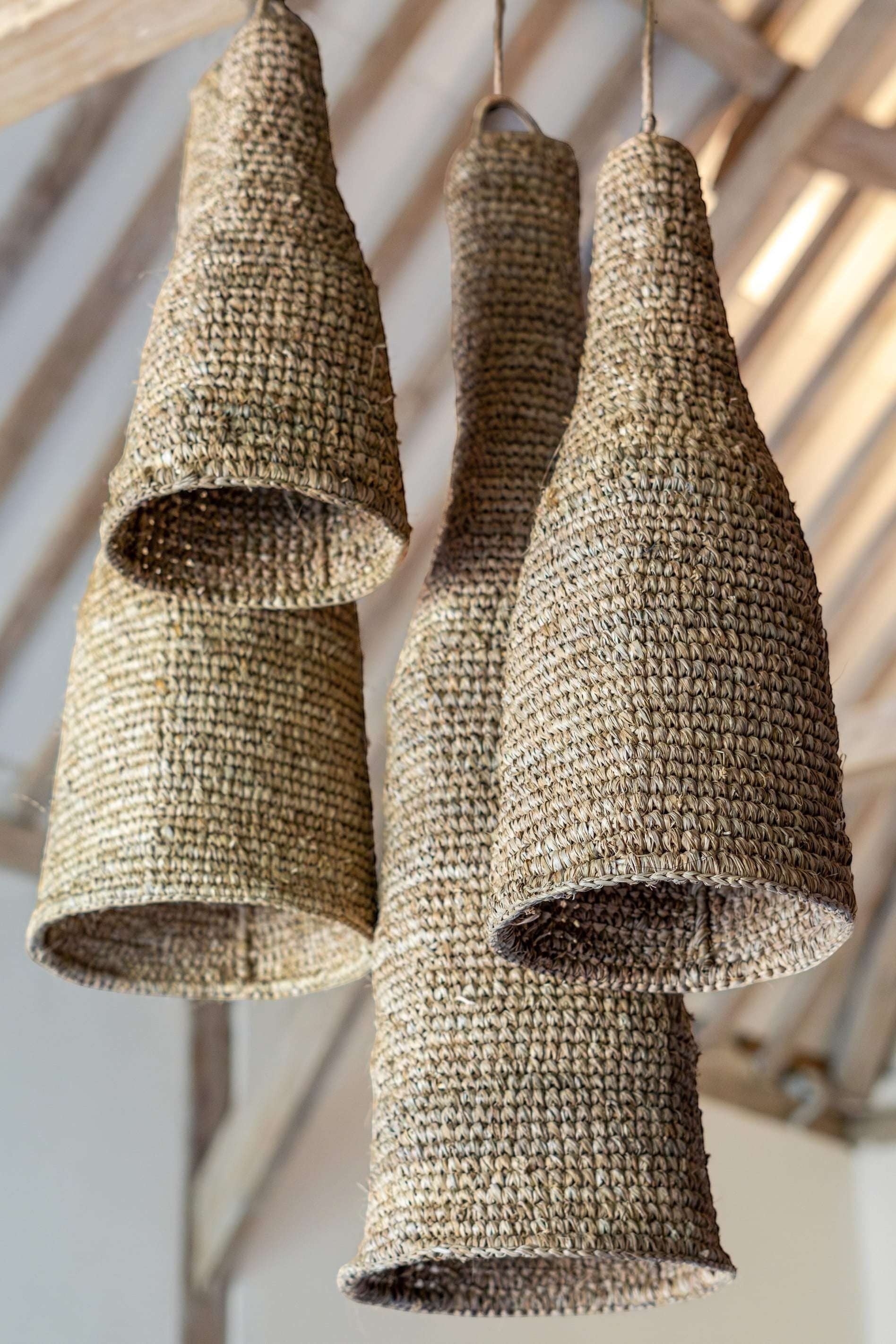 Kayu Living natural sisal pendant lampshade, bell-shaped with woven texture, adds rustic elegance to any room.