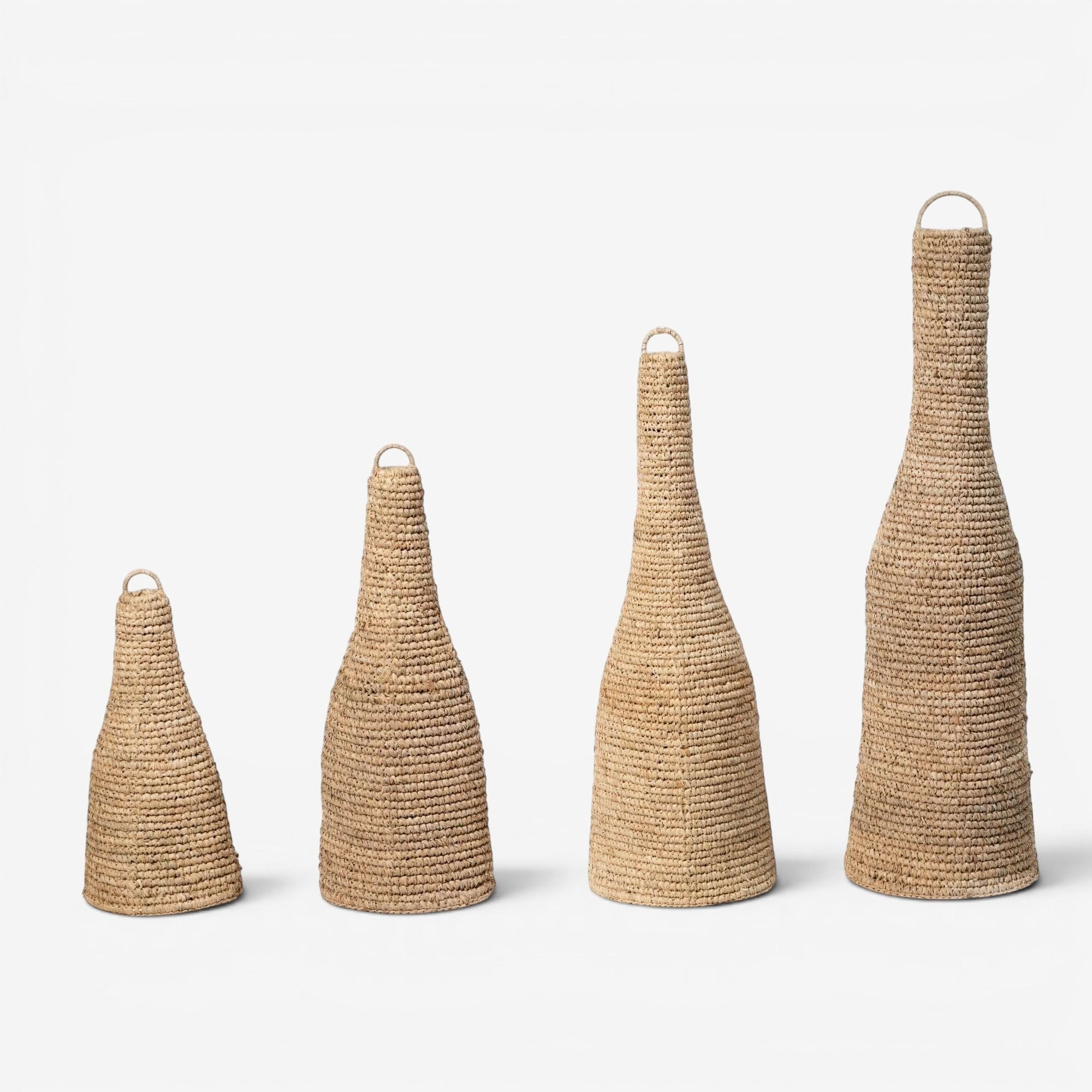 Kayu Living natural sisal pendant lampshade in a wasp house shape, available in four sizes, with a rustic woven texture.