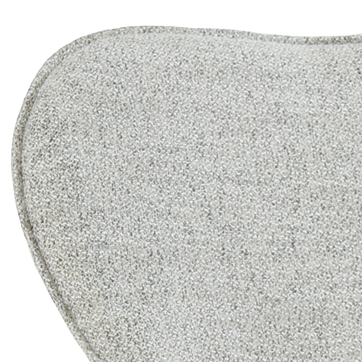 Close-up of the textured bisque fabric on the Kayu Living Sven swivel armchair, showing soft neutral upholstery.