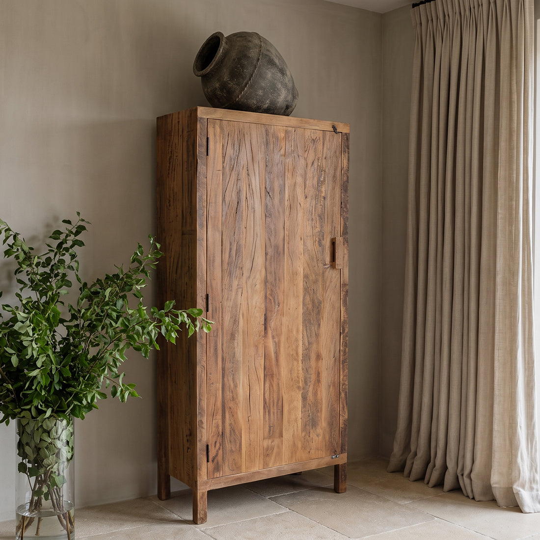 Farmwood cabinet by Raw Materials made from FSC recycled wood, showcasing a natural wooden storage unit with a minimalist design.