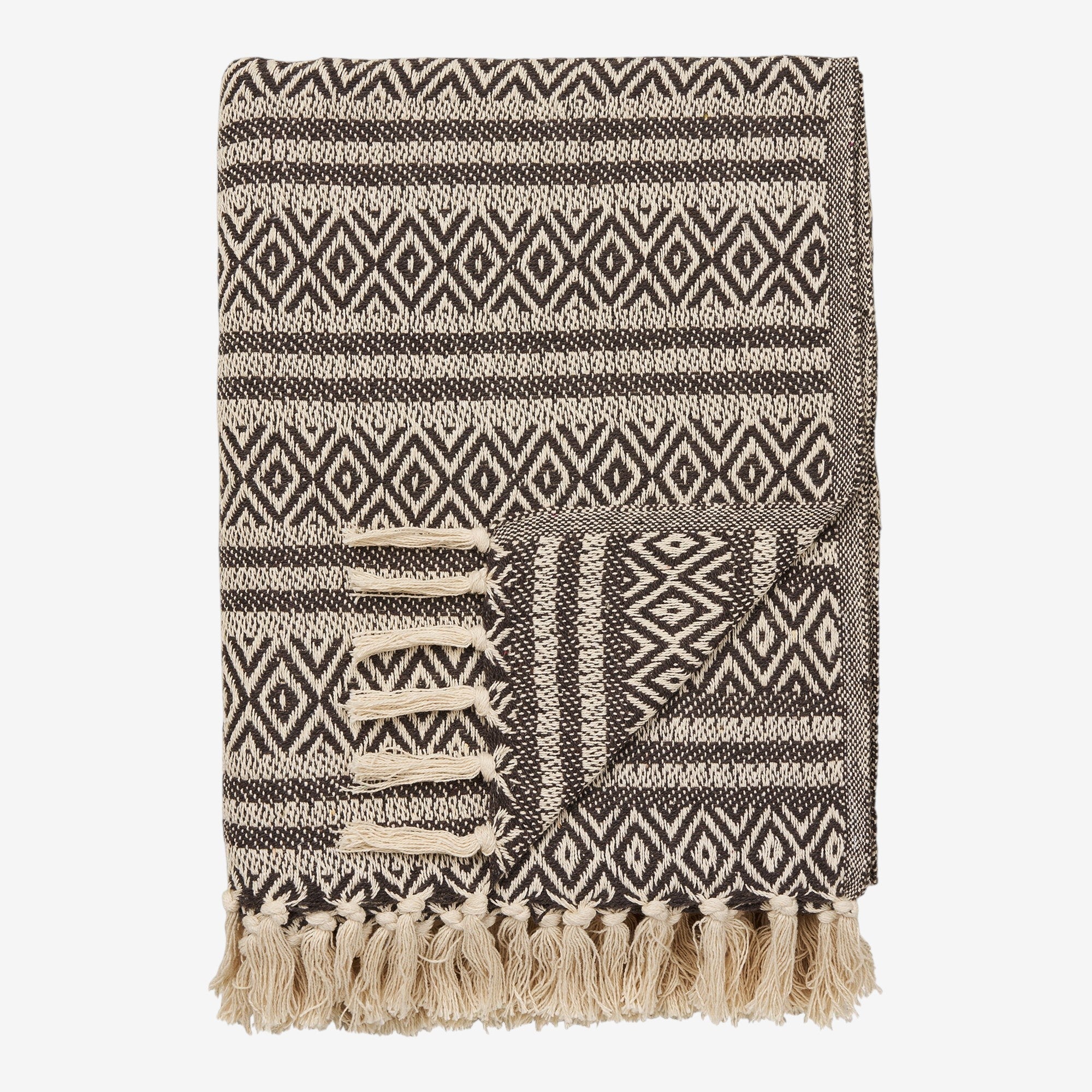 Kayu Living Adana brown plaid throw blanket with geometric patterns and cream-colored fringe tassels