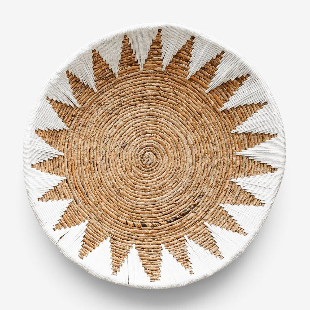 Kayu Living handcrafted XL bamboo star wall plate in natural brown and white cotton, featuring a bohemian sun design.
