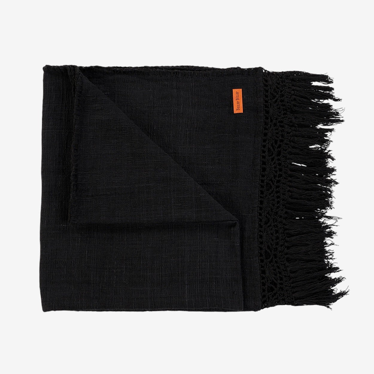 Kayu Living black cotton Gypsy bed throw with decorative fringe and textured weave, perfect for bohemian home decor.