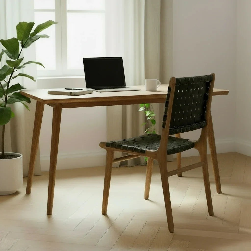 Kayu Living Umalas dining chair with hand-woven black leather seat and teak frame. Modern design.