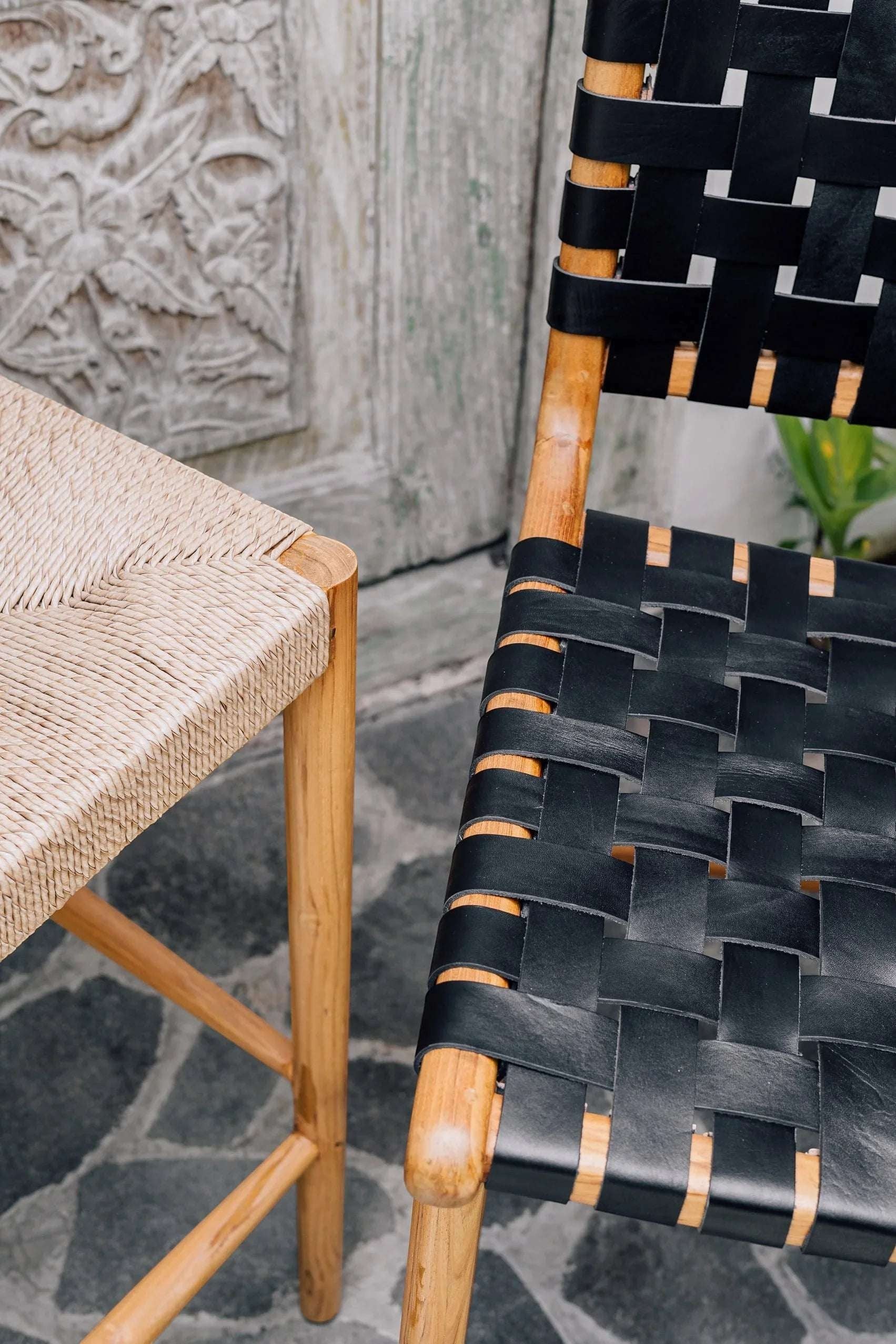 Kayu Living Umalas counter stool with woven black leather seat and teak frame. Modern artisanal design.