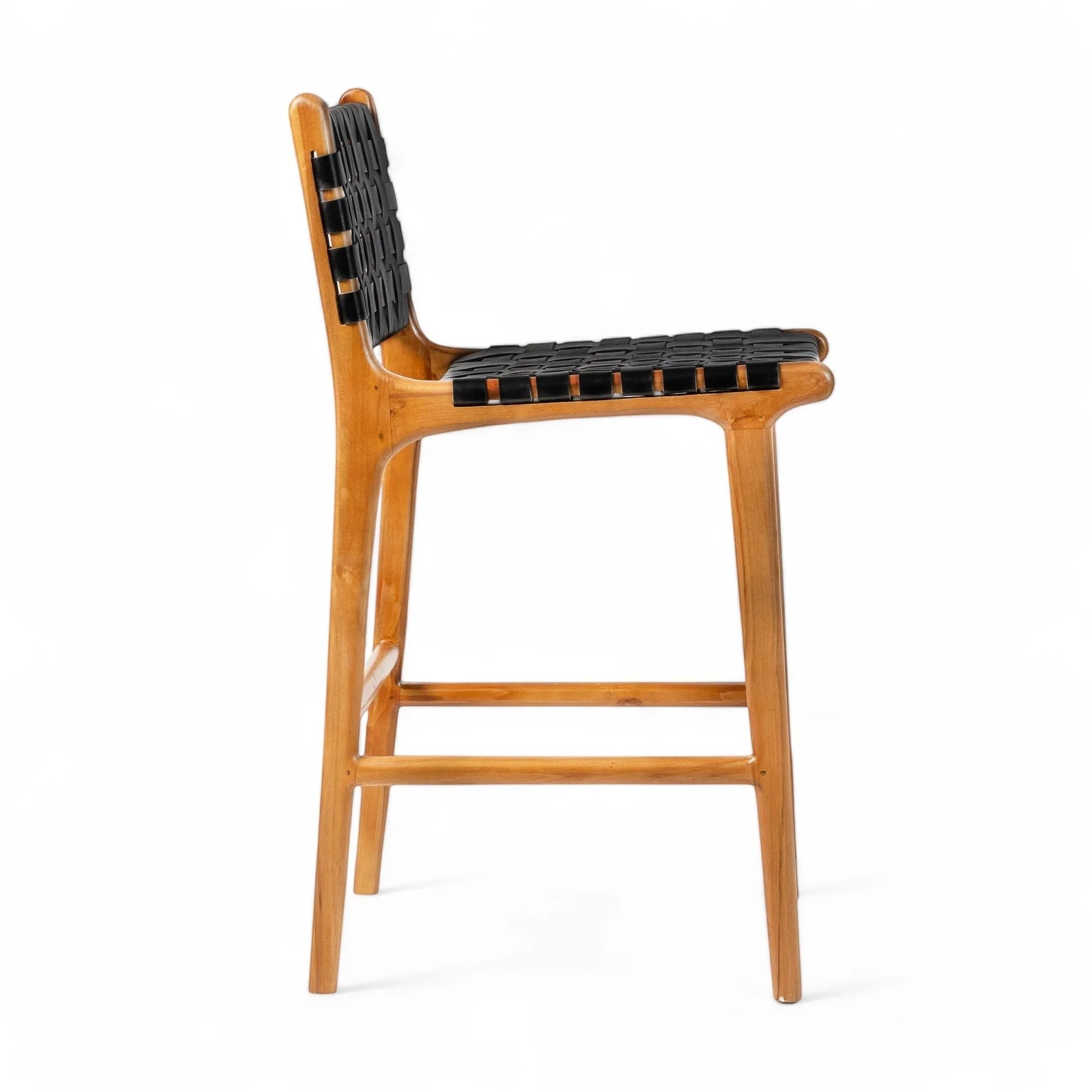 Kayu Living Umalas counter stool with black woven leather seat and natural teak wood frame. Modern bar stool.