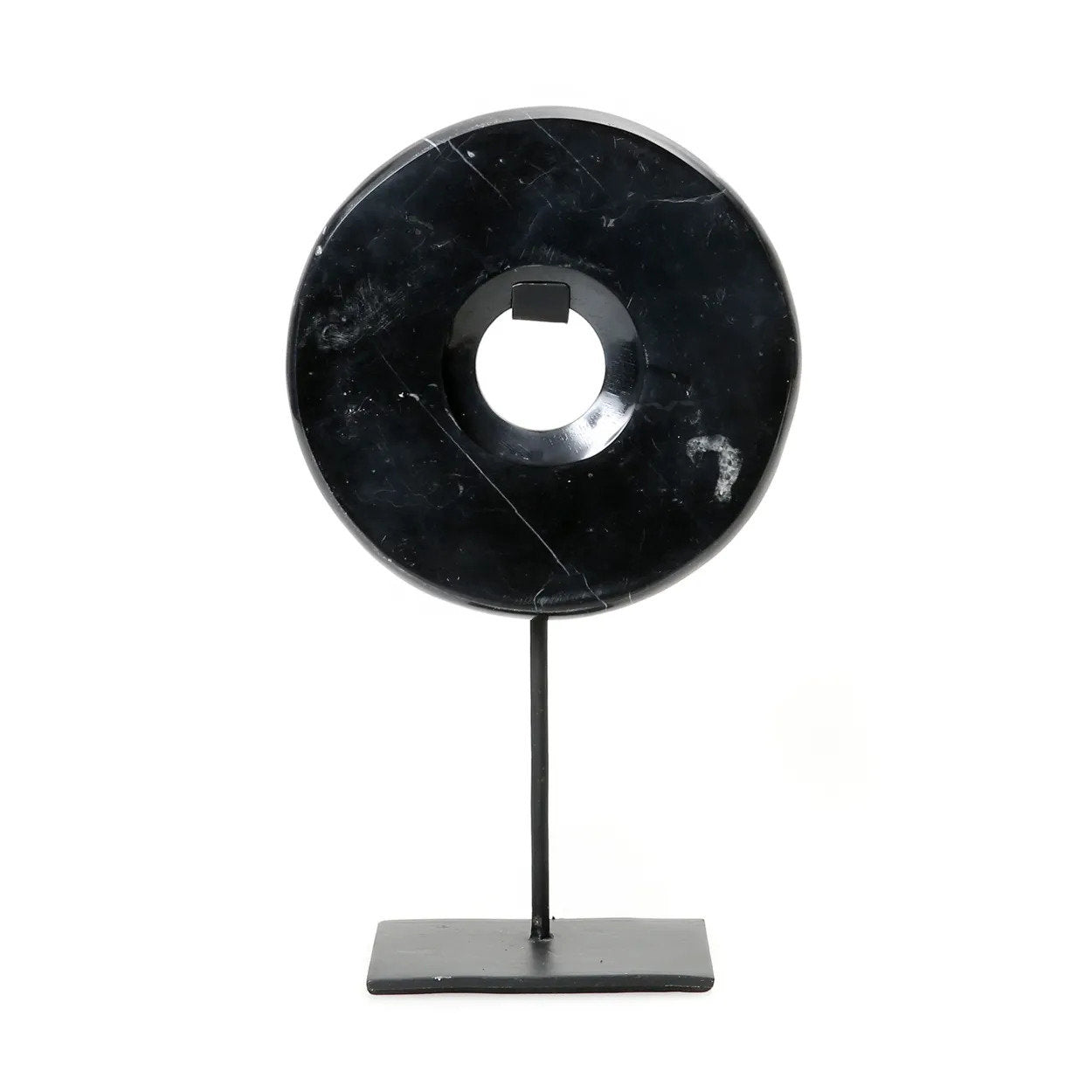 Kayu Living medium black marble disc sculpture with subtle veining on a minimalist black metal stand