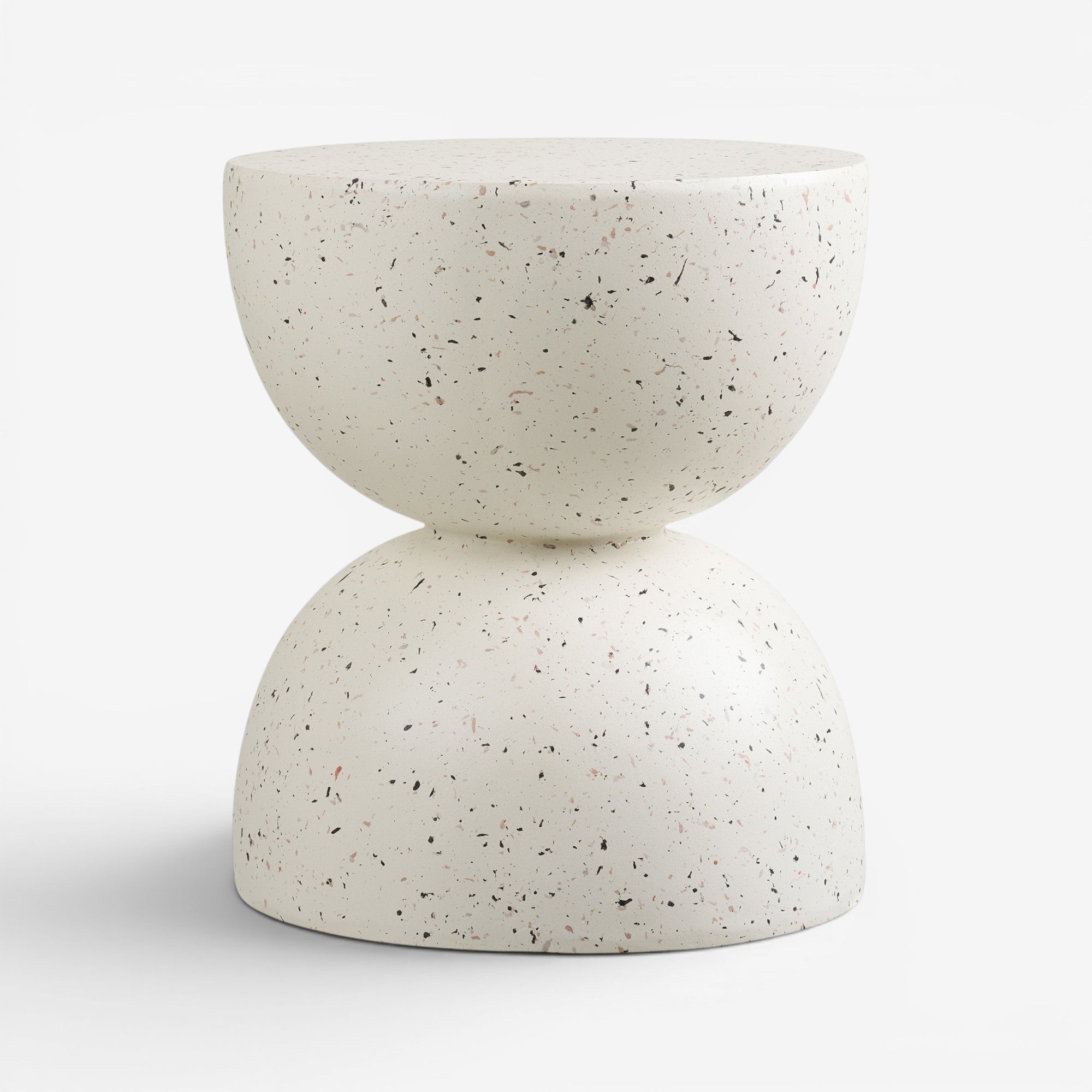 Kayu Living Bonita side table in off-white fiberclay with a speckled terrazzo finish and hourglass silhouette.