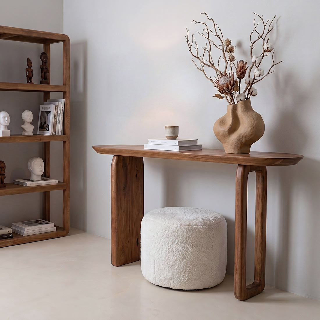 Kayu Living brown bullnose console table made of solid mango wood with rounded edges in a minimalist living room