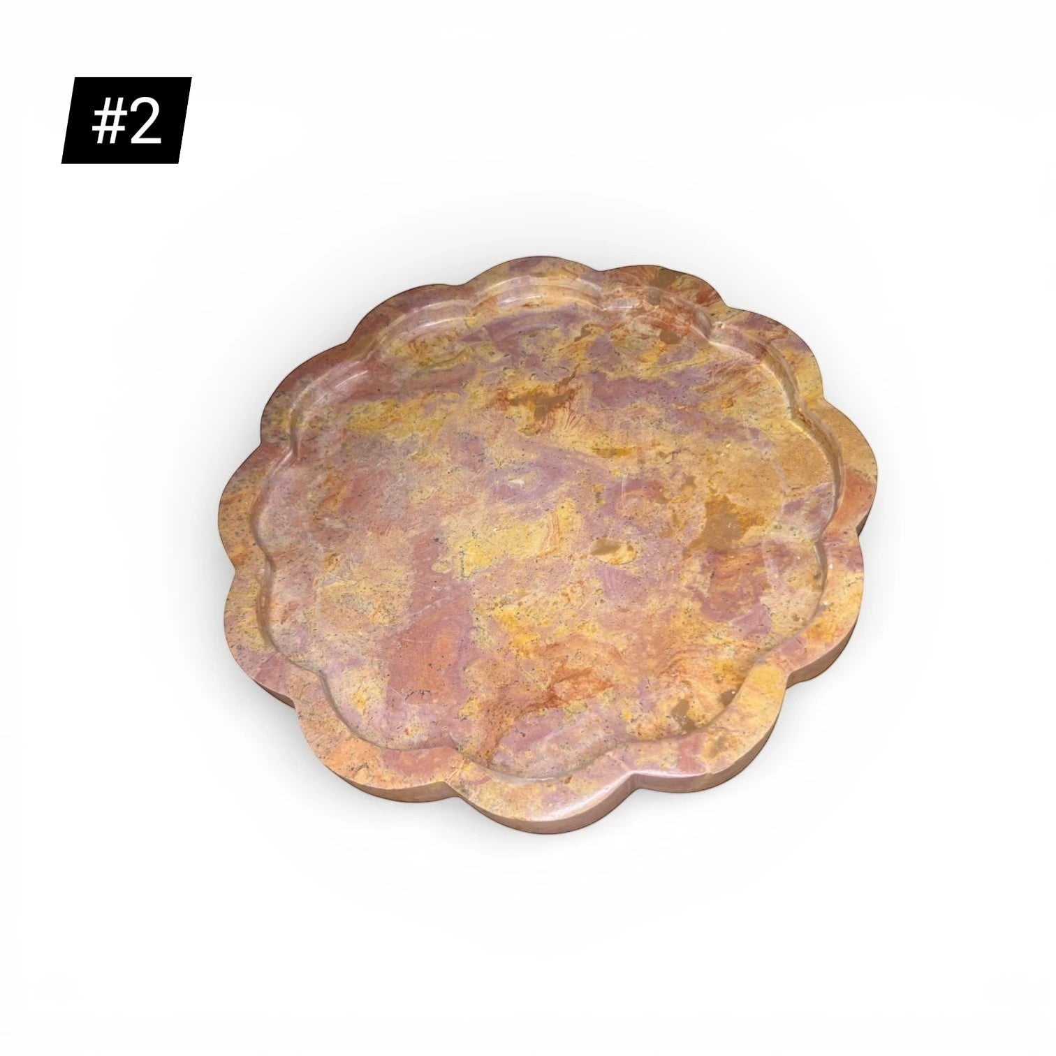 Kayu Living Petal Tray in caramel veined onyx stone with pink, ochre, and terracotta hues. Features a wavy, petal-like edge.