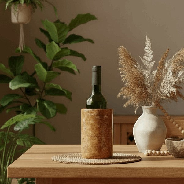 Kayu Living caramel onyx wine cooler and vase with unique veining. Dual-purpose handcrafted stone accent.