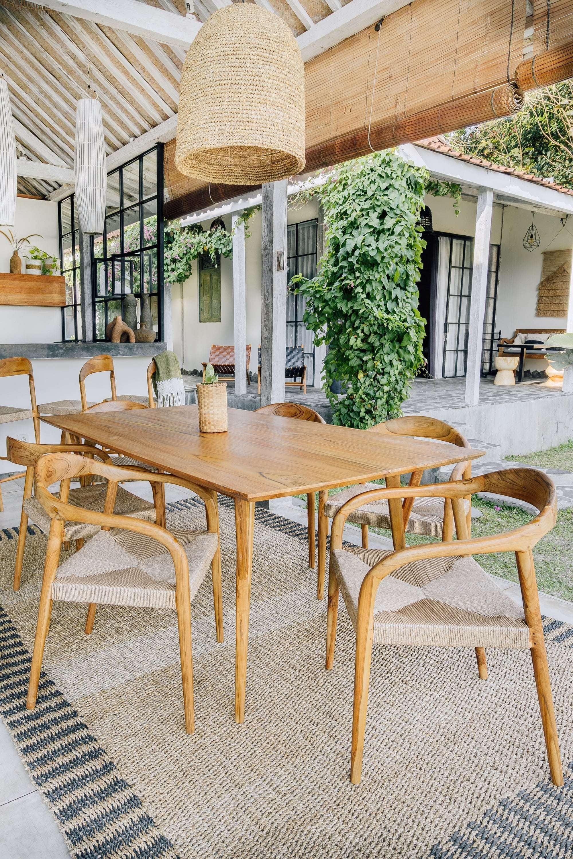 Kayu Living Cemagi chair with teak frame and handwoven rope seat, suitable for indoor/outdoor use.