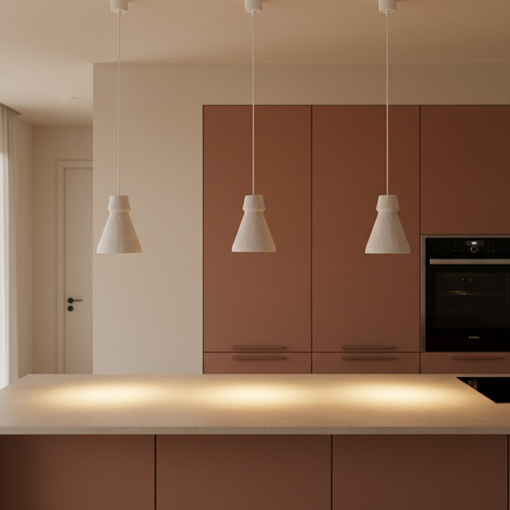 Kayu Living Chalk Pugal pendant lamps with matte textured finish hanging over a modern kitchen island