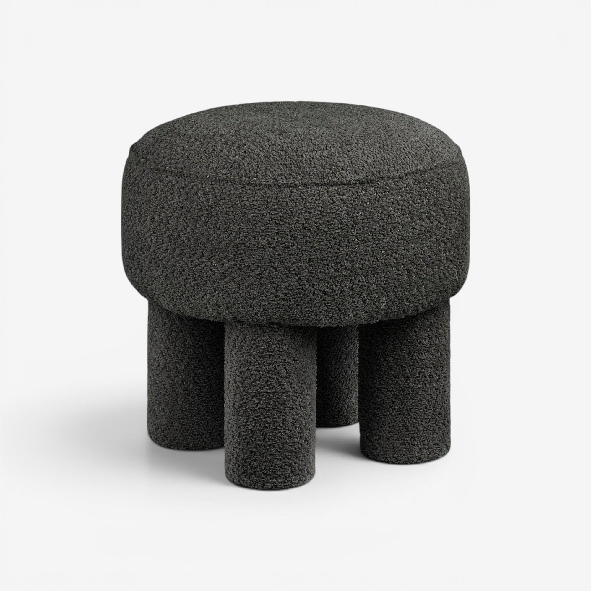 Kayu Living charcoal round pouf with four cylindrical legs, upholstered in textured polyester fabric.