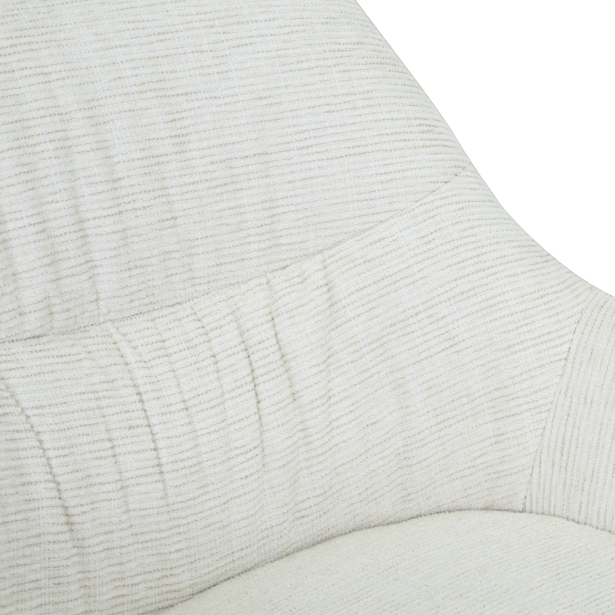 Kayu Living Daphne swivel armchair in sand textured fabric with a close-up view of the upholstery detail.