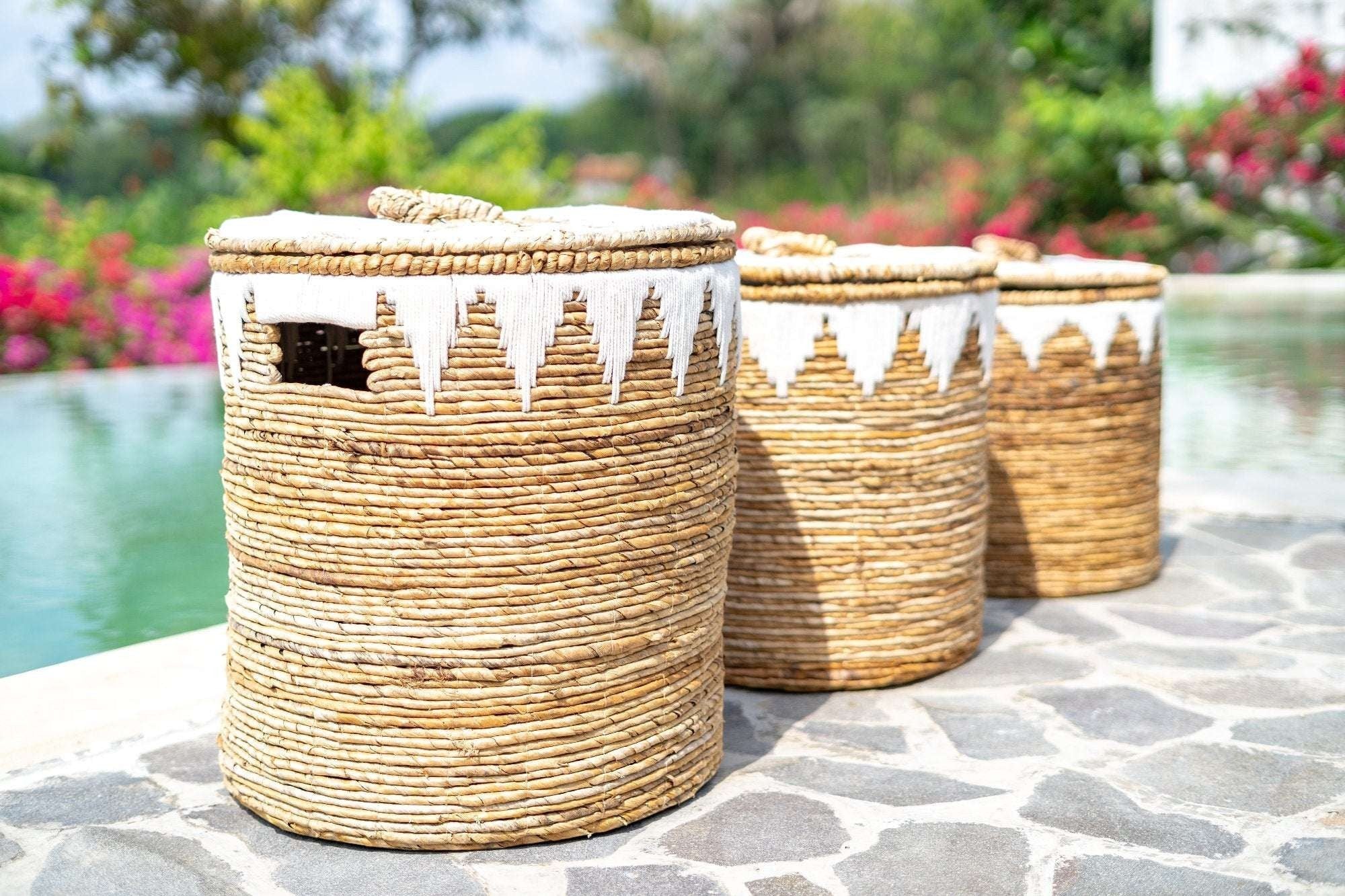 Kayu Living natural banana cord storage basket with lid and white embroidery detail. Eco-friendly and stylish home organization.