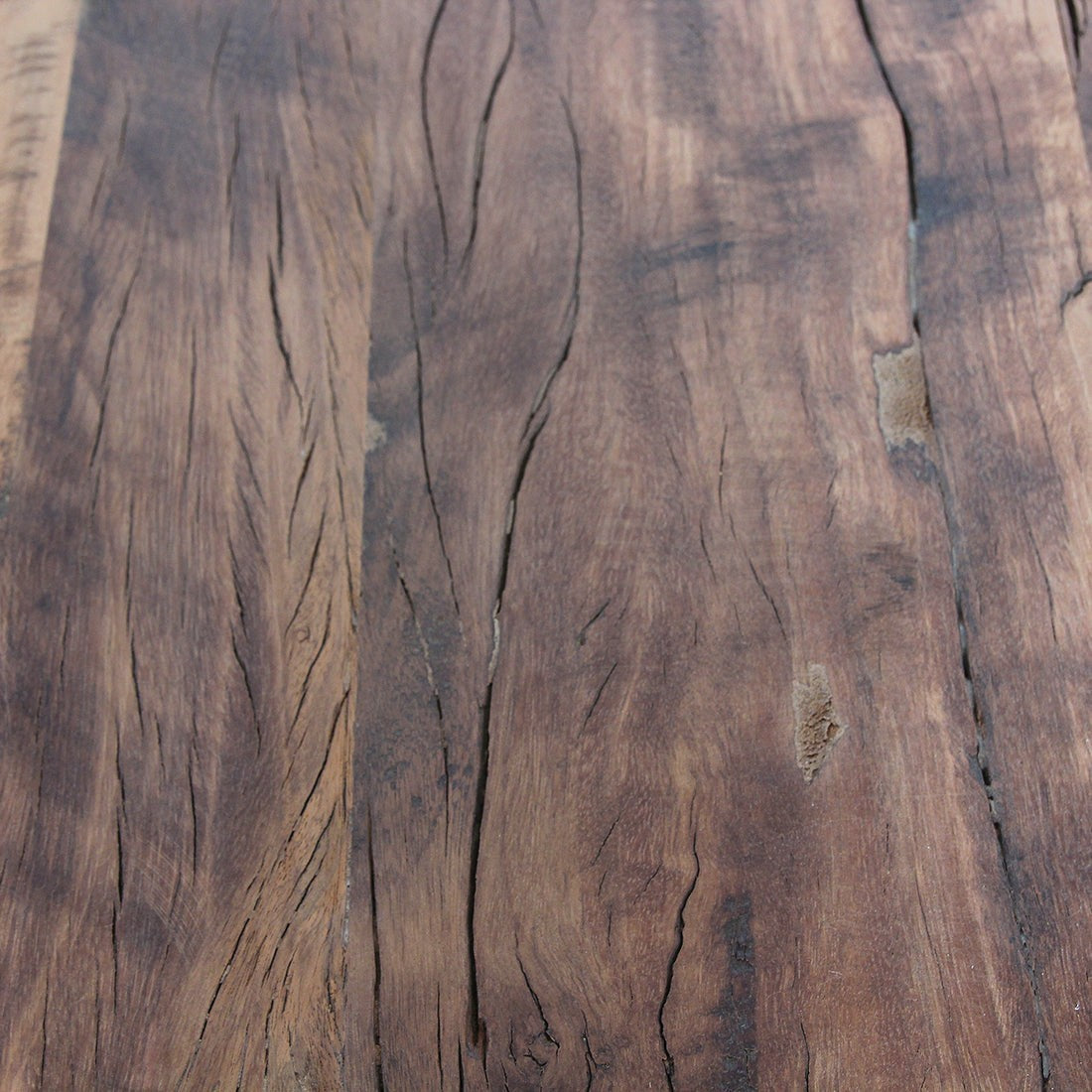 Close-up of Kayu Living Farmwood wall table surface showing natural knots, deep grains, and rustic recycled wood texture.