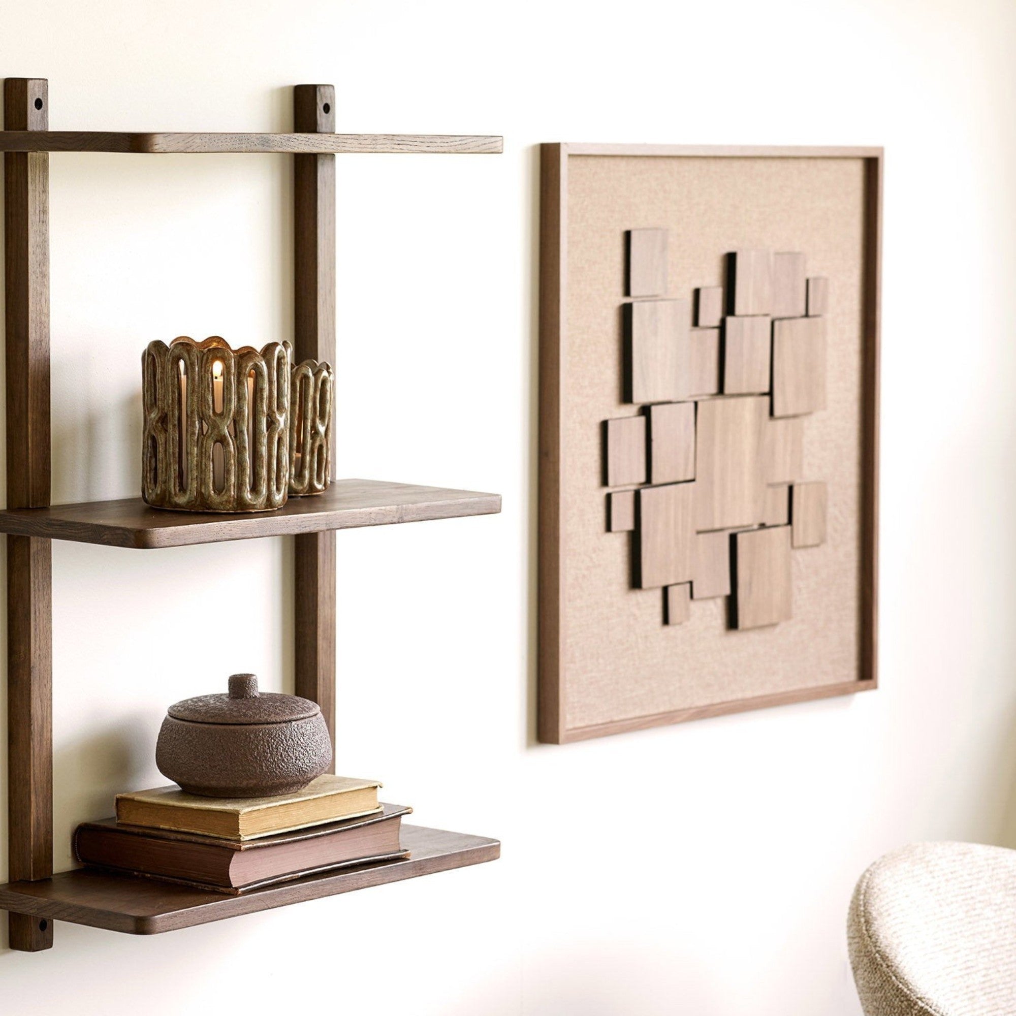 Kayu Living Gala Relief Wall Decoration featuring brown geometric wooden blocks on a textured square frame.